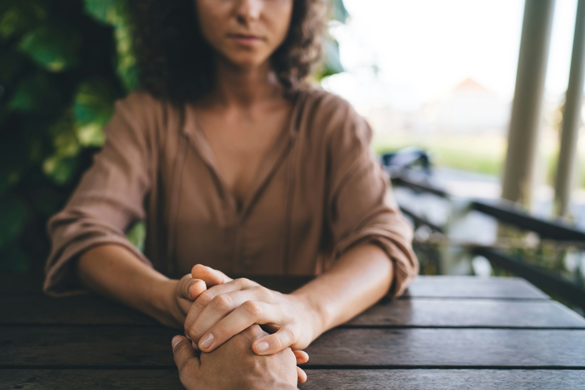 unrecognizable couple praying togetherness during spiritual assistance and ritual patience for suppo